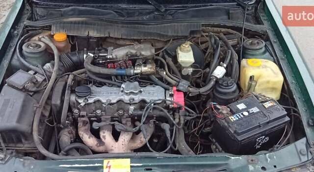 Зелений Опель Вектра, об'ємом двигуна 2 л та пробігом 350 тис. км за 1150 $, фото 6 на Automoto.ua