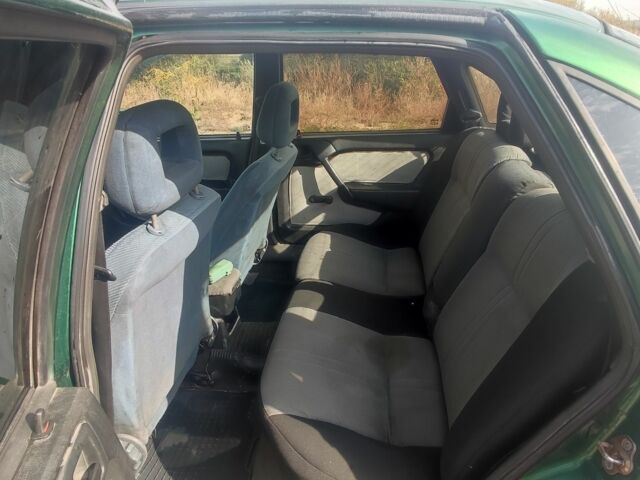 Зеленый Опель Вектра, объемом двигателя 1 л и пробегом 340 тыс. км за 1200 $, фото 6 на Automoto.ua