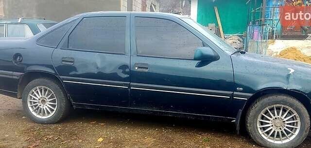 Зелений Опель Вектра, об'ємом двигуна 2 л та пробігом 100 тис. км за 1150 $, фото 3 на Automoto.ua