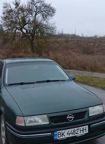 Зелений Опель Вектра, об'ємом двигуна 2 л та пробігом 350 тис. км за 1150 $, фото 4 на Automoto.ua