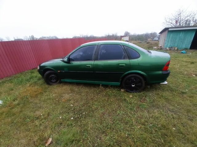 Зеленый Опель Вектра, объемом двигателя 1.8 л и пробегом 398 тыс. км за 1100 $, фото 7 на Automoto.ua