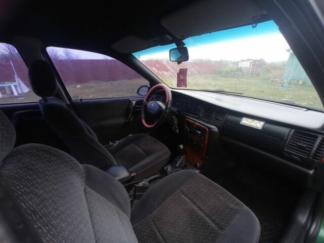 Зеленый Опель Вектра, объемом двигателя 1.8 л и пробегом 398 тыс. км за 1100 $, фото 4 на Automoto.ua