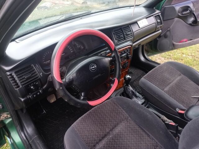 Зеленый Опель Вектра, объемом двигателя 1.8 л и пробегом 398 тыс. км за 1100 $, фото 1 на Automoto.ua