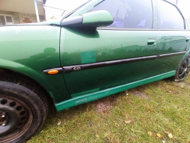 Зеленый Опель Вектра, объемом двигателя 1.8 л и пробегом 398 тыс. км за 1100 $, фото 12 на Automoto.ua