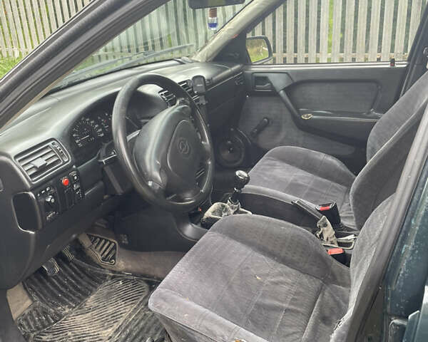 Зелений Опель Вектра, об'ємом двигуна 1.6 л та пробігом 380 тис. км за 1000 $, фото 4 на Automoto.ua