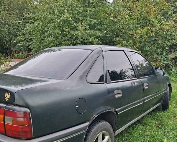 Зеленый Опель Вектра, объемом двигателя 2 л и пробегом 456 тыс. км за 1150 $, фото 4 на Automoto.ua