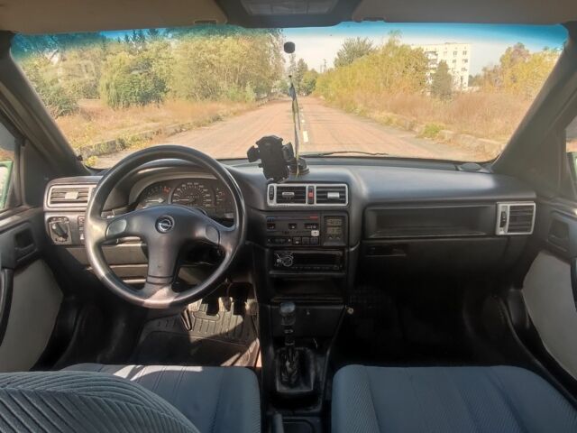 Зеленый Опель Вектра, объемом двигателя 1 л и пробегом 340 тыс. км за 1200 $, фото 3 на Automoto.ua