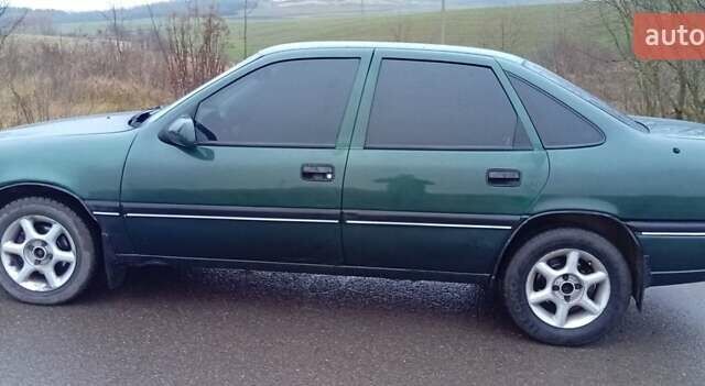 Зеленый Опель Вектра, объемом двигателя 2 л и пробегом 350 тыс. км за 1450 $, фото 3 на Automoto.ua