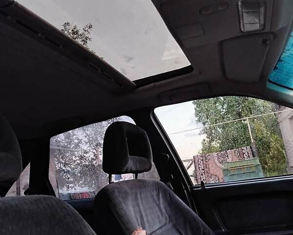 Зелений Опель Вектра, об'ємом двигуна 1.8 л та пробігом 255 тис. км за 2000 $, фото 5 на Automoto.ua