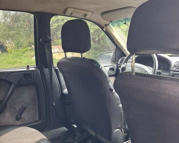 Зеленый Опель Вектра, объемом двигателя 2 л и пробегом 456 тыс. км за 1150 $, фото 3 на Automoto.ua