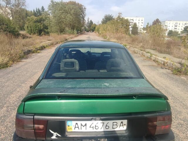 Зеленый Опель Вектра, объемом двигателя 1 л и пробегом 340 тыс. км за 1200 $, фото 7 на Automoto.ua