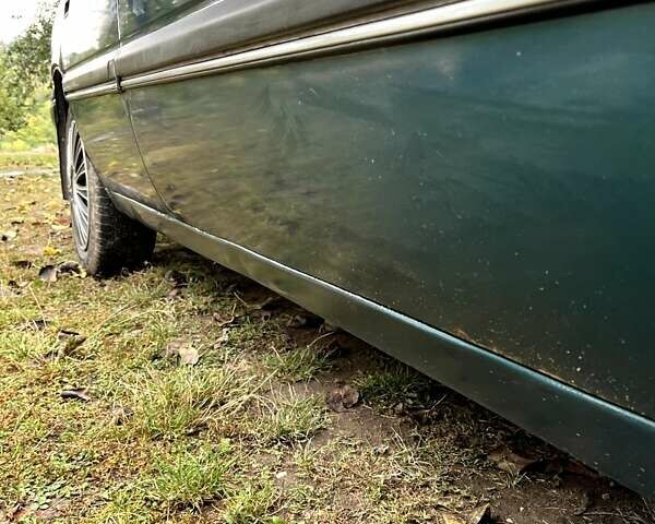 Зеленый Опель Вектра, объемом двигателя 2 л и пробегом 319 тыс. км за 1750 $, фото 4 на Automoto.ua