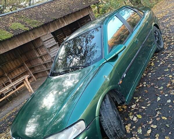 Зелений Опель Вектра, об'ємом двигуна 2 л та пробігом 300 тис. км за 1850 $, фото 1 на Automoto.ua