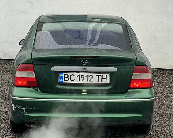 Зелений Опель Вектра, об'ємом двигуна 2 л та пробігом 359 тис. км за 899 $, фото 11 на Automoto.ua