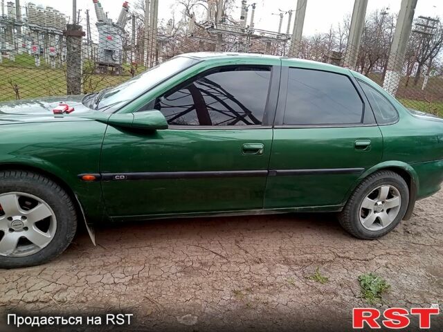 Зеленый Опель Вектра, объемом двигателя 1.8 л и пробегом 120 тыс. км за 3000 $, фото 2 на Automoto.ua