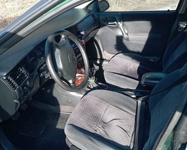 Зеленый Опель Вектра, объемом двигателя 2 л и пробегом 370 тыс. км за 2600 $, фото 5 на Automoto.ua
