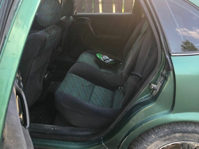 Зеленый Опель Вектра, объемом двигателя 1.6 л и пробегом 280 тыс. км за 1000 $, фото 15 на Automoto.ua