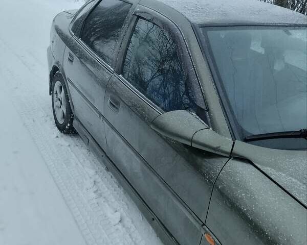 Зеленый Опель Вектра, объемом двигателя 1.6 л и пробегом 296 тыс. км за 2250 $, фото 7 на Automoto.ua