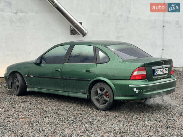 Зелений Опель Вектра, об'ємом двигуна 2 л та пробігом 359 тис. км за 899 $, фото 10 на Automoto.ua