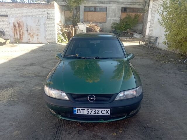 Зеленый Опель Вектра, объемом двигателя 2.5 л и пробегом 223 тыс. км за 2500 $, фото 2 на Automoto.ua