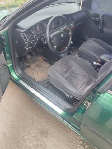 Зеленый Опель Вектра, объемом двигателя 2 л и пробегом 246 тыс. км за 2000 $, фото 22 на Automoto.ua