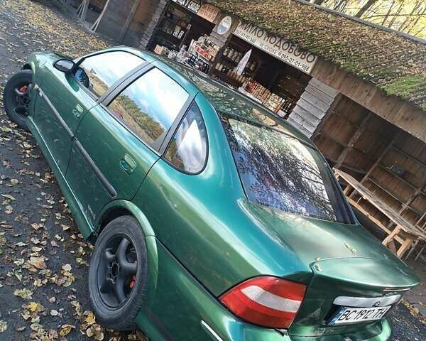 Зеленый Опель Вектра, объемом двигателя 2 л и пробегом 350 тыс. км за 1850 $, фото 2 на Automoto.ua