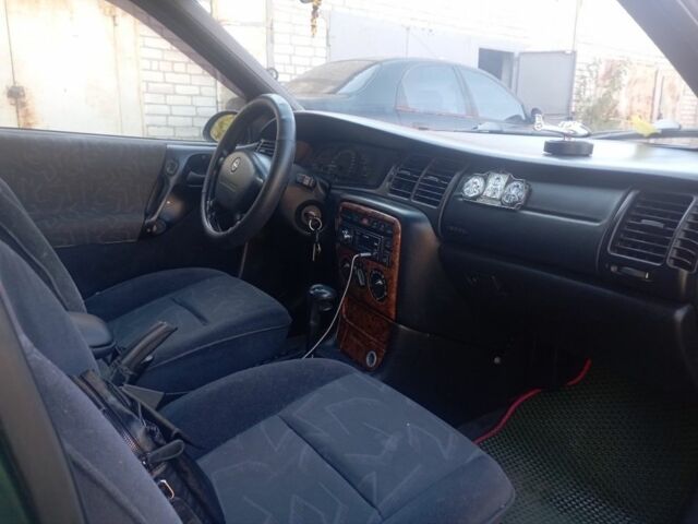 Зеленый Опель Вектра, объемом двигателя 2.5 л и пробегом 223 тыс. км за 2500 $, фото 4 на Automoto.ua