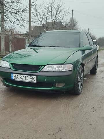 Зеленый Опель Вектра, объемом двигателя 2 л и пробегом 246 тыс. км за 2000 $, фото 1 на Automoto.ua