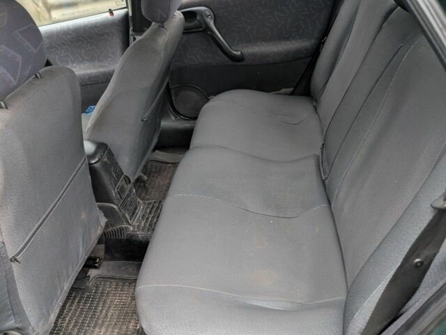 Зелений Опель Вектра, об'ємом двигуна 2 л та пробігом 1000 тис. км за 2000 $, фото 4 на Automoto.ua