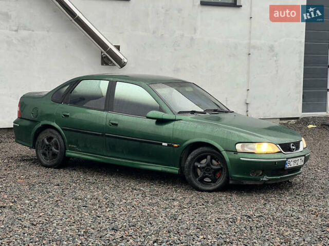 Зелений Опель Вектра, об'ємом двигуна 2 л та пробігом 359 тис. км за 899 $, фото 4 на Automoto.ua