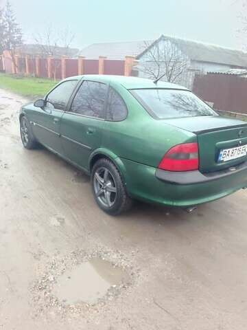 Зеленый Опель Вектра, объемом двигателя 2 л и пробегом 246 тыс. км за 2000 $, фото 4 на Automoto.ua