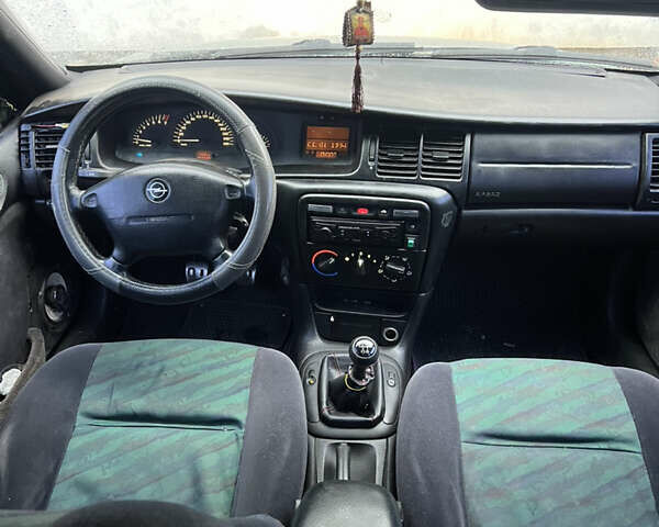 Зелений Опель Вектра, об'ємом двигуна 2 л та пробігом 359 тис. км за 899 $, фото 15 на Automoto.ua