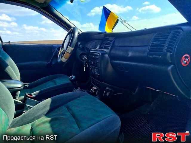 Зеленый Опель Вектра, объемом двигателя 1.7 л и пробегом 250 тыс. км за 1900 $, фото 9 на Automoto.ua