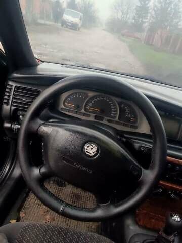 Зеленый Опель Вектра, объемом двигателя 2 л и пробегом 246 тыс. км за 2000 $, фото 43 на Automoto.ua