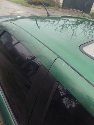 Зеленый Опель Вектра, объемом двигателя 2 л и пробегом 246 тыс. км за 2000 $, фото 11 на Automoto.ua