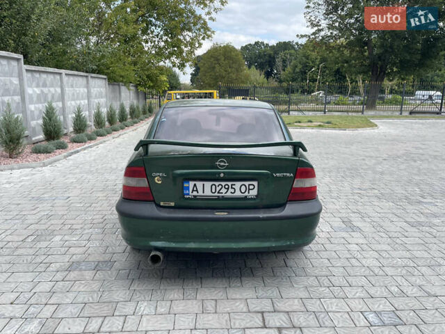 Зеленый Опель Вектра, объемом двигателя 1.8 л и пробегом 350 тыс. км за 950 $, фото 4 на Automoto.ua