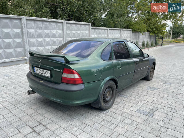 Зеленый Опель Вектра, объемом двигателя 1.8 л и пробегом 350 тыс. км за 999 $, фото 5 на Automoto.ua