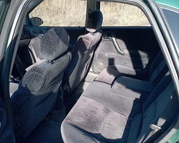 Зеленый Опель Вектра, объемом двигателя 2 л и пробегом 370 тыс. км за 2600 $, фото 4 на Automoto.ua