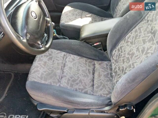 Зеленый Опель Вектра, объемом двигателя 1.6 л и пробегом 325 тыс. км за 3000 $, фото 14 на Automoto.ua