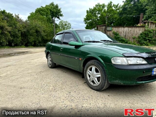 Зеленый Опель Вектра, объемом двигателя 2 л и пробегом 300 тыс. км за 2600 $, фото 2 на Automoto.ua