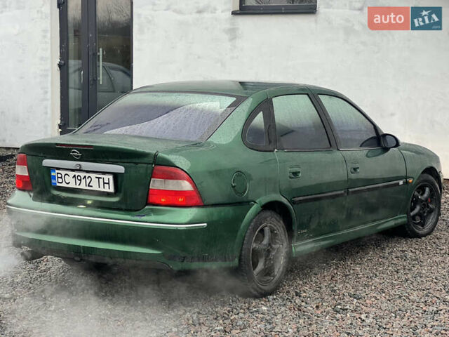 Зелений Опель Вектра, об'ємом двигуна 2 л та пробігом 359 тис. км за 899 $, фото 12 на Automoto.ua