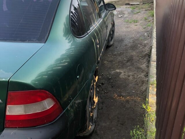 Зеленый Опель Вектра, объемом двигателя 1.6 л и пробегом 280 тыс. км за 1000 $, фото 1 на Automoto.ua