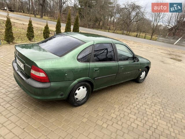 Зеленый Опель Вектра, объемом двигателя 1.6 л и пробегом 405 тыс. км за 1600 $, фото 11 на Automoto.ua