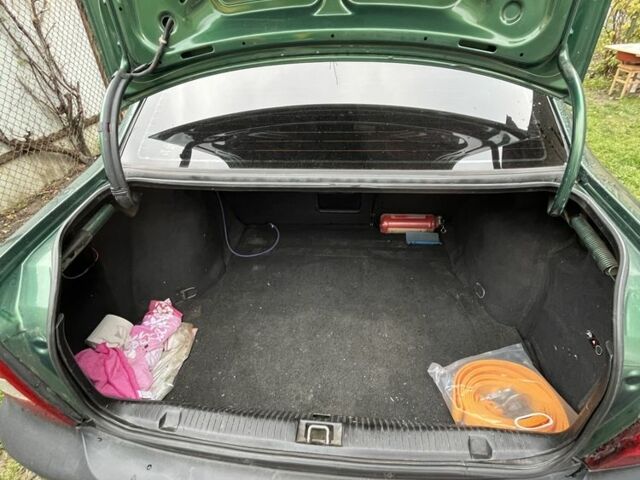 Зелений Опель Вектра, об'ємом двигуна 1.6 л та пробігом 273 тис. км за 2800 $, фото 9 на Automoto.ua