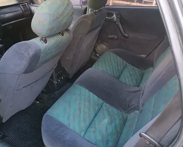 Зелений Опель Вектра, об'ємом двигуна 2 л та пробігом 300 тис. км за 1850 $, фото 7 на Automoto.ua