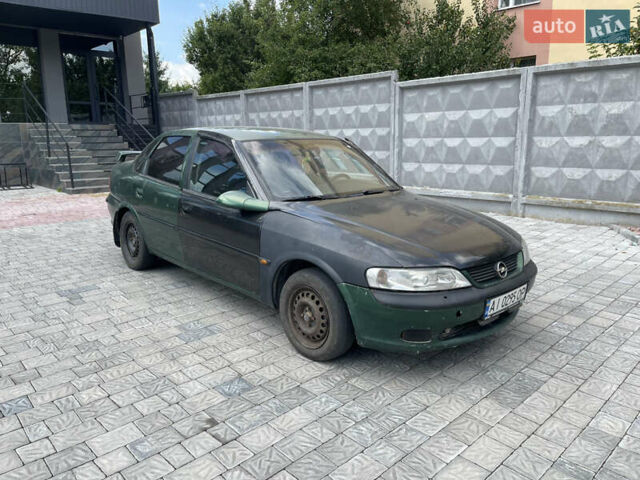 Зеленый Опель Вектра, объемом двигателя 1.8 л и пробегом 350 тыс. км за 999 $, фото 7 на Automoto.ua