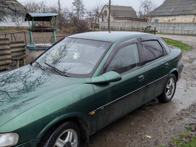 Зелений Опель Вектра, об'ємом двигуна 2 л та пробігом 1000 тис. км за 2000 $, фото 1 на Automoto.ua