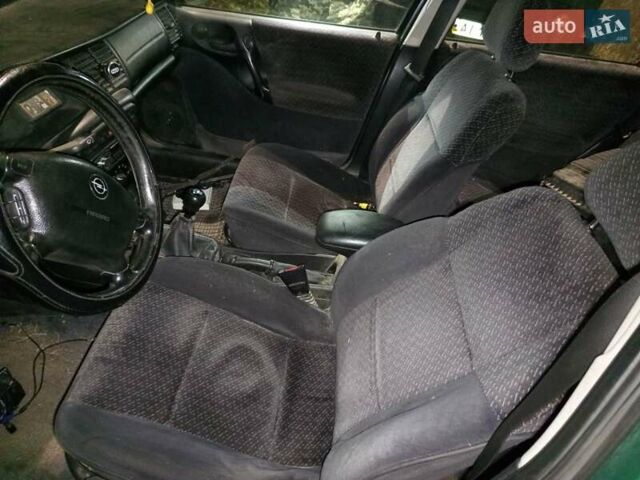 Зеленый Опель Вектра, объемом двигателя 1.8 л и пробегом 319 тыс. км за 1000 $, фото 25 на Automoto.ua