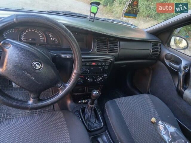 Зелений Опель Вектра, об'ємом двигуна 1.6 л та пробігом 345 тис. км за 1800 $, фото 14 на Automoto.ua