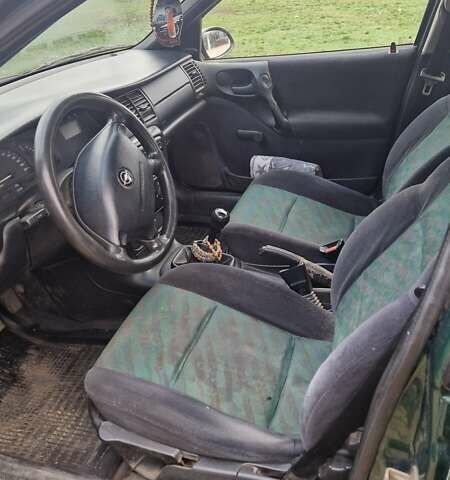 Зелений Опель Вектра, об'ємом двигуна 1.6 л та пробігом 280 тис. км за 1400 $, фото 5 на Automoto.ua